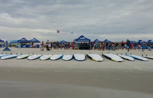 Surfers are getting ready for a day of fun. 